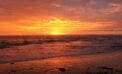 sunset shore nature Strange weather, stranger words to describe it